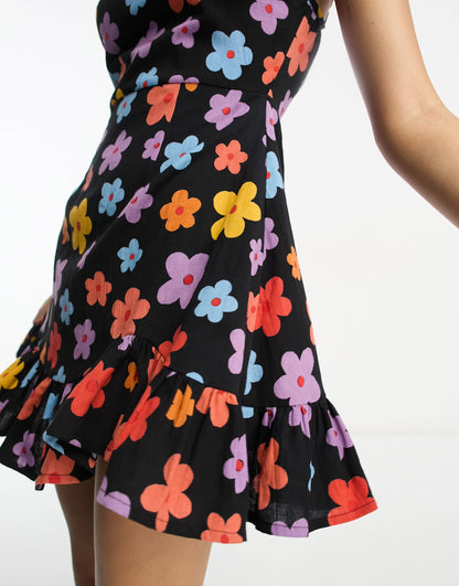 ASOS DESIGN linen cami mini sundress with ruffle hem in bold daisy print
