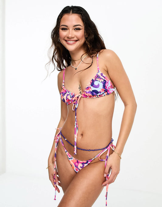 Kulani Kinis Thong tie side bikini bottom in Tipsy Dip floral print