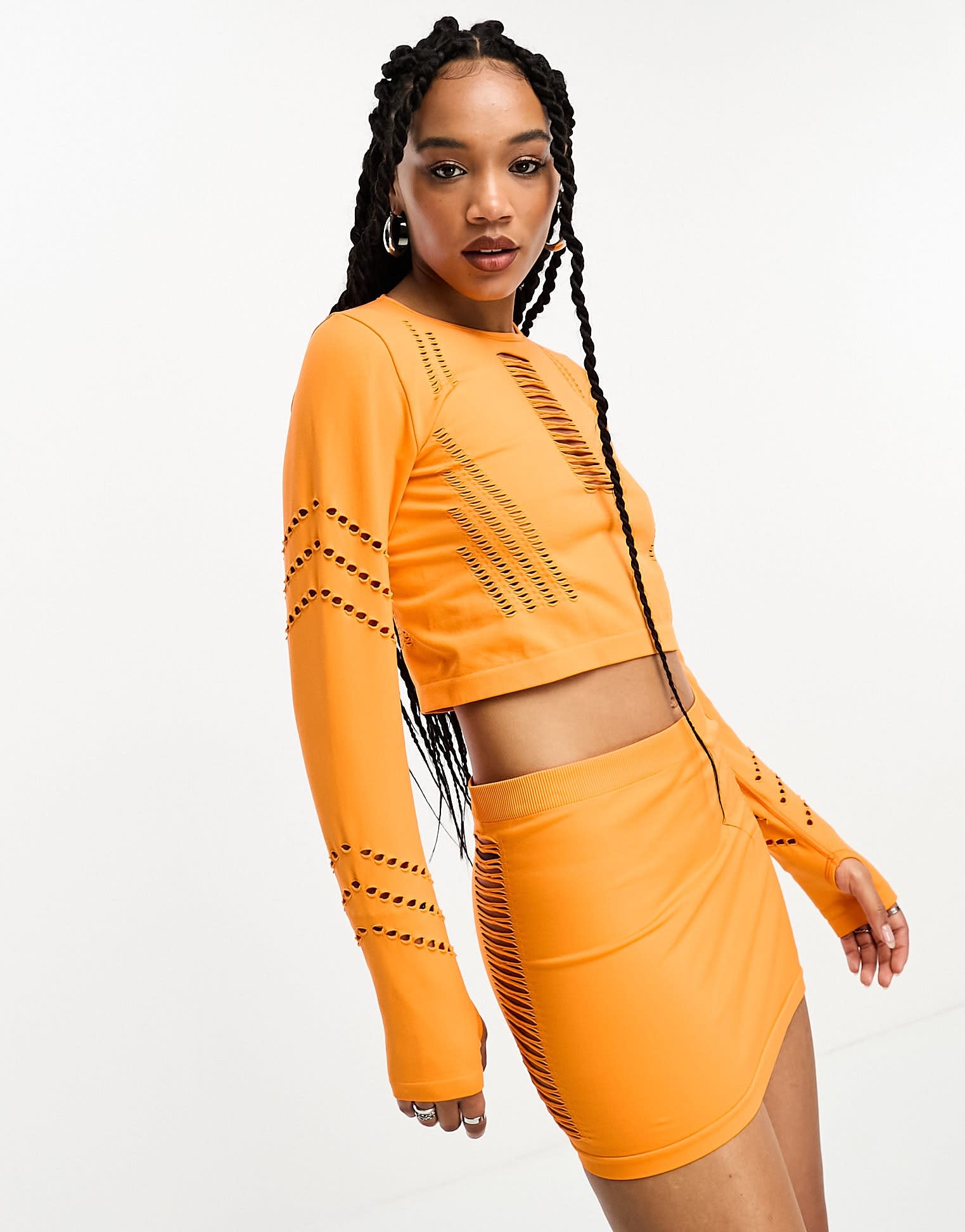 Only seamless cut out mini skirt co-ord in orange