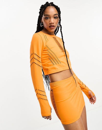 Only seamless cut out mini skirt co-ord in orange