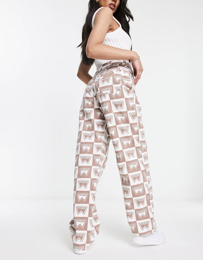 Wrangler mom relaxed fit all over monogram print jeans in brown