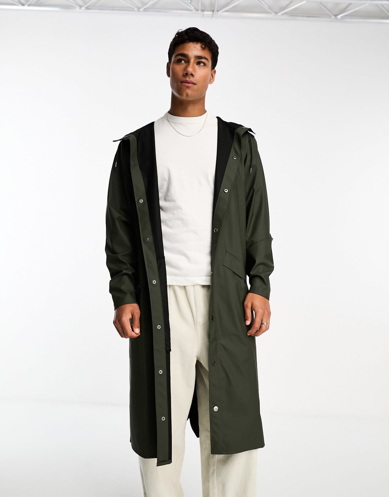 Rains waterproof hooded long line jacket in dark green