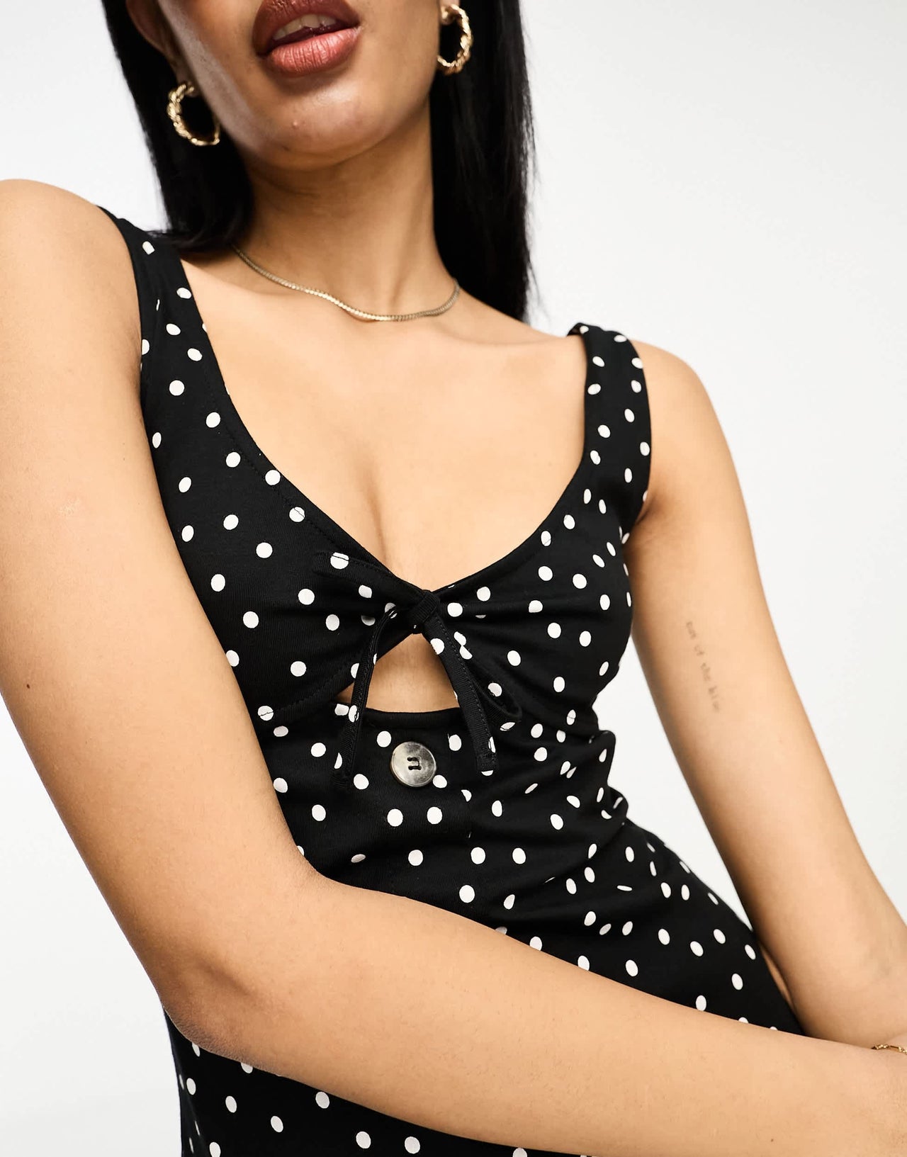 ASOS DESIGN sleeveless midi dress with buttons and tie detail in black spot