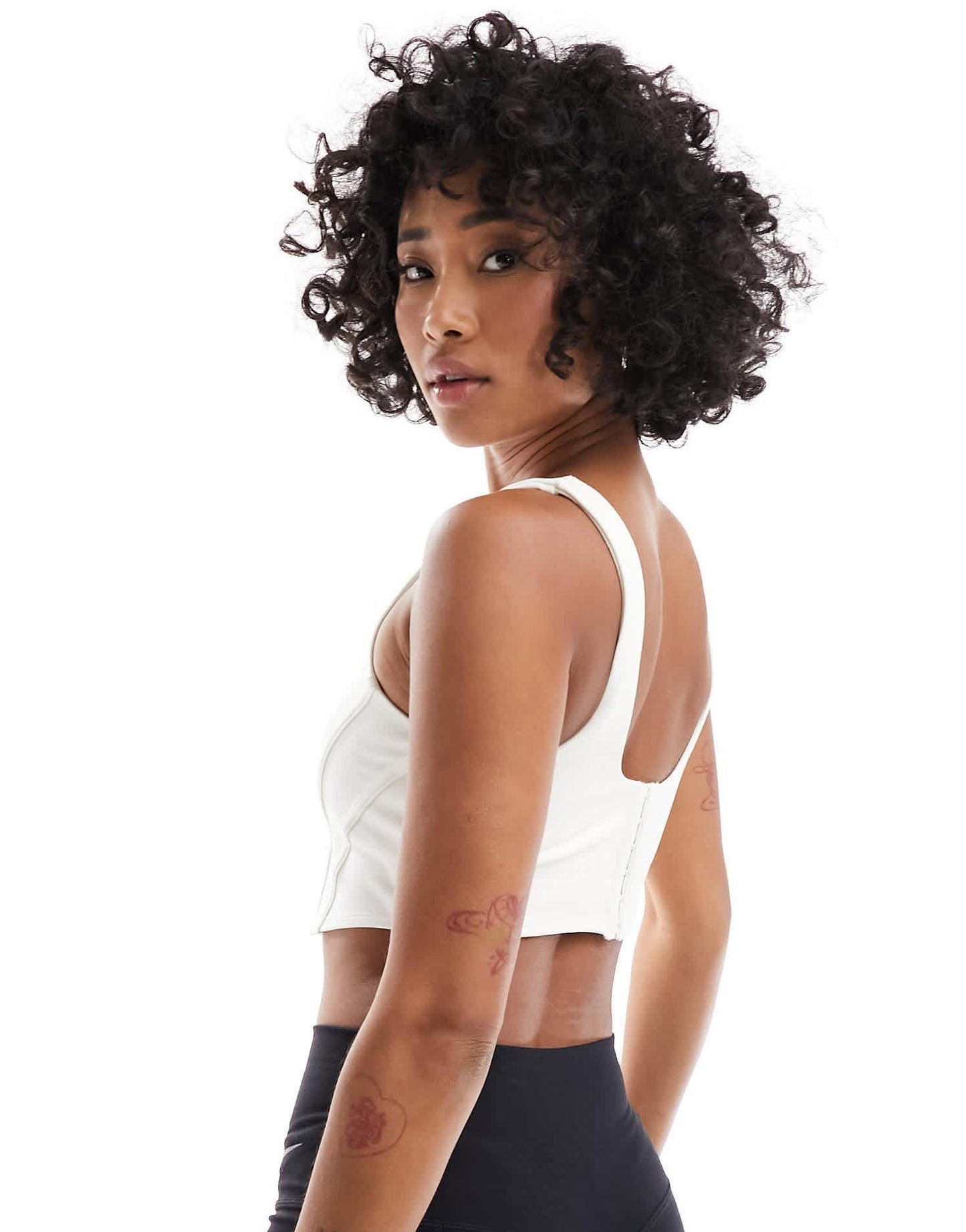 Nike Training swoosh corset light support sports bra in white - WHITE