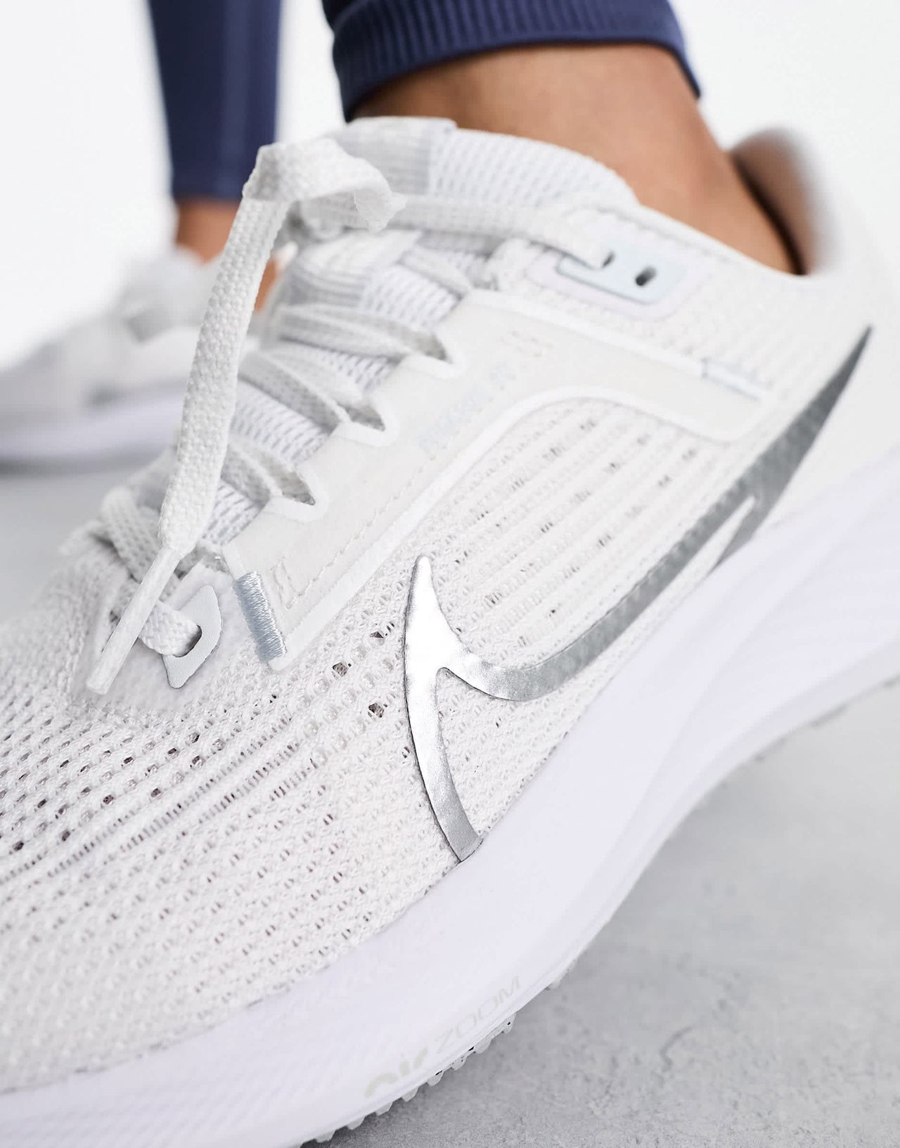Nike Running Air Zoom Pegasus 40 trainers in white with silver detail