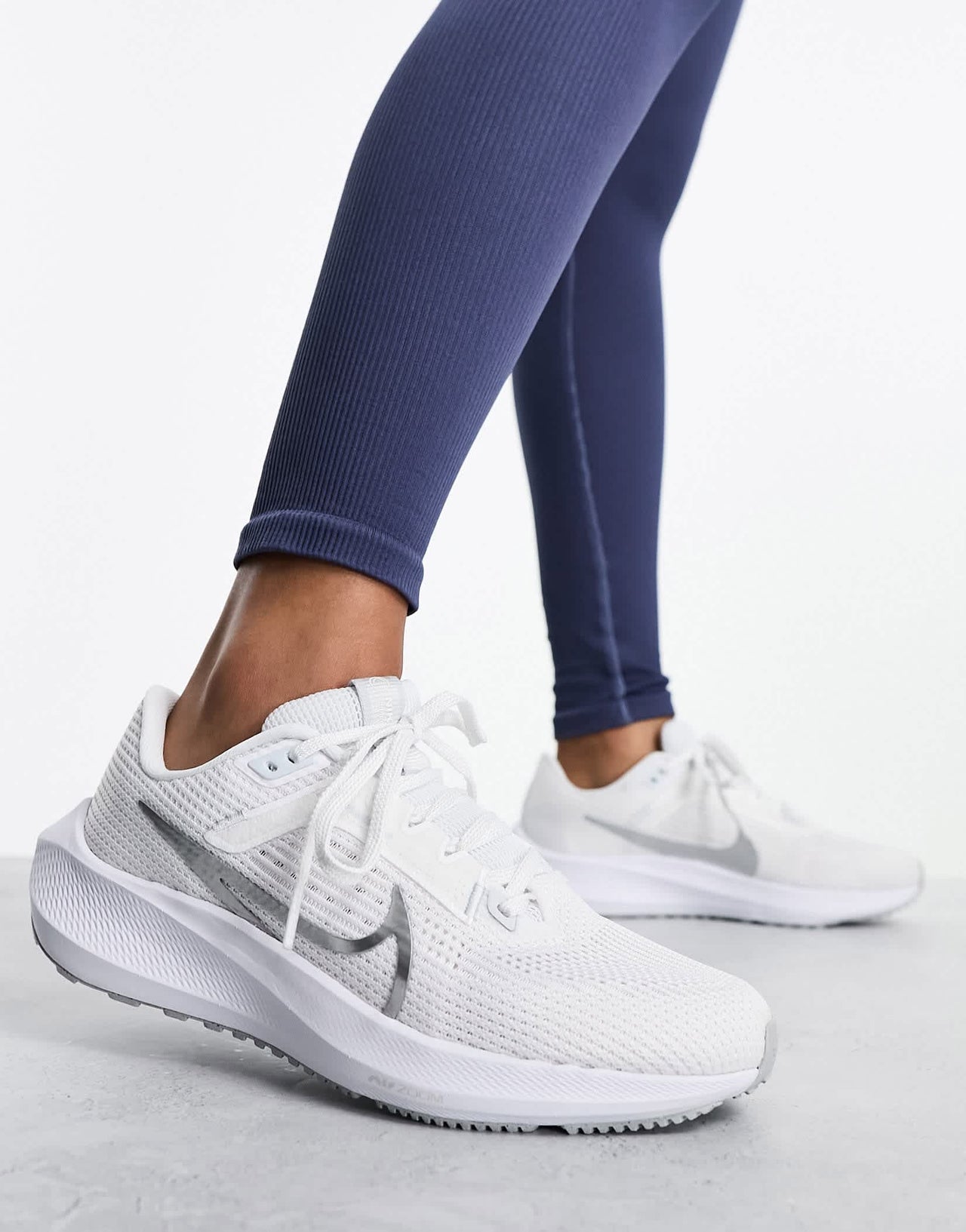 Nike Running Air Zoom Pegasus 40 trainers in white with silver detail