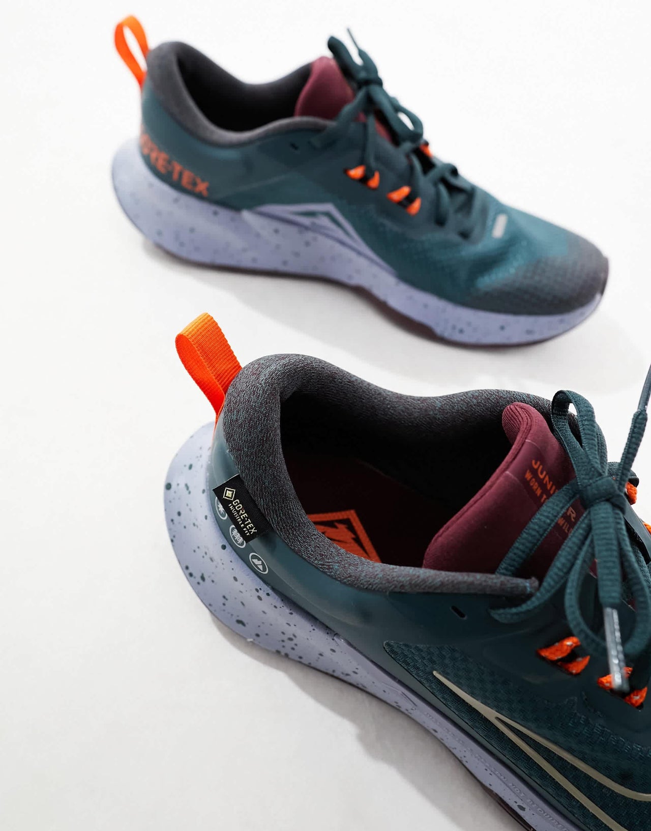 Nike Running Juniper Trail 2 trainers in deep green and maroon