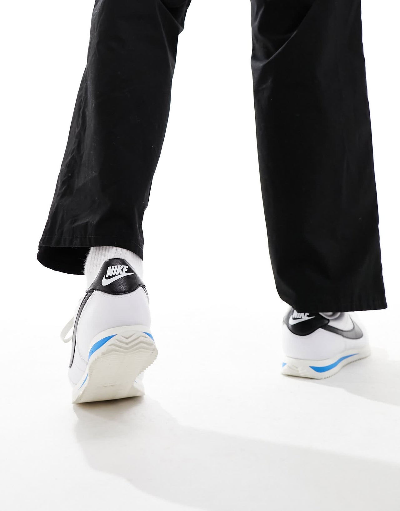 Nike Cortez leather trainers in white and black