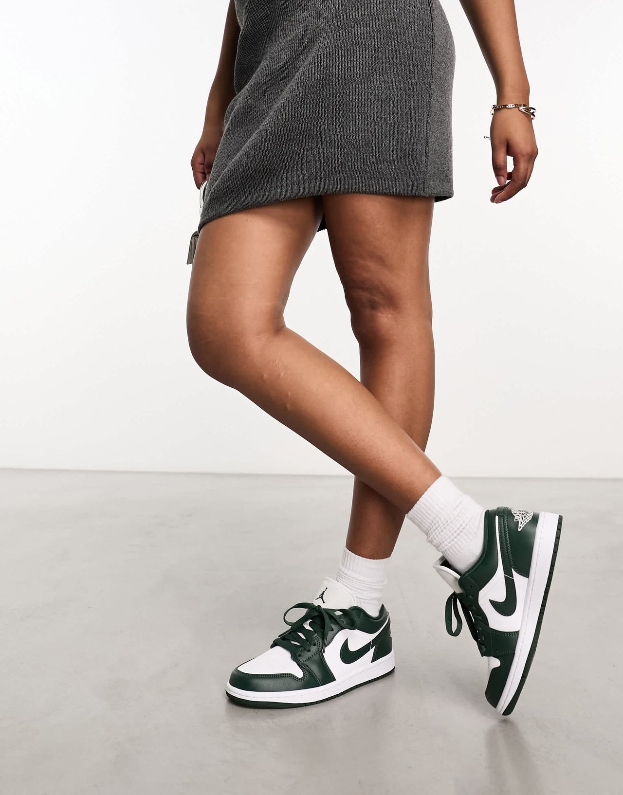 Nike Air Jordan 1 low trainers in white and jade green
