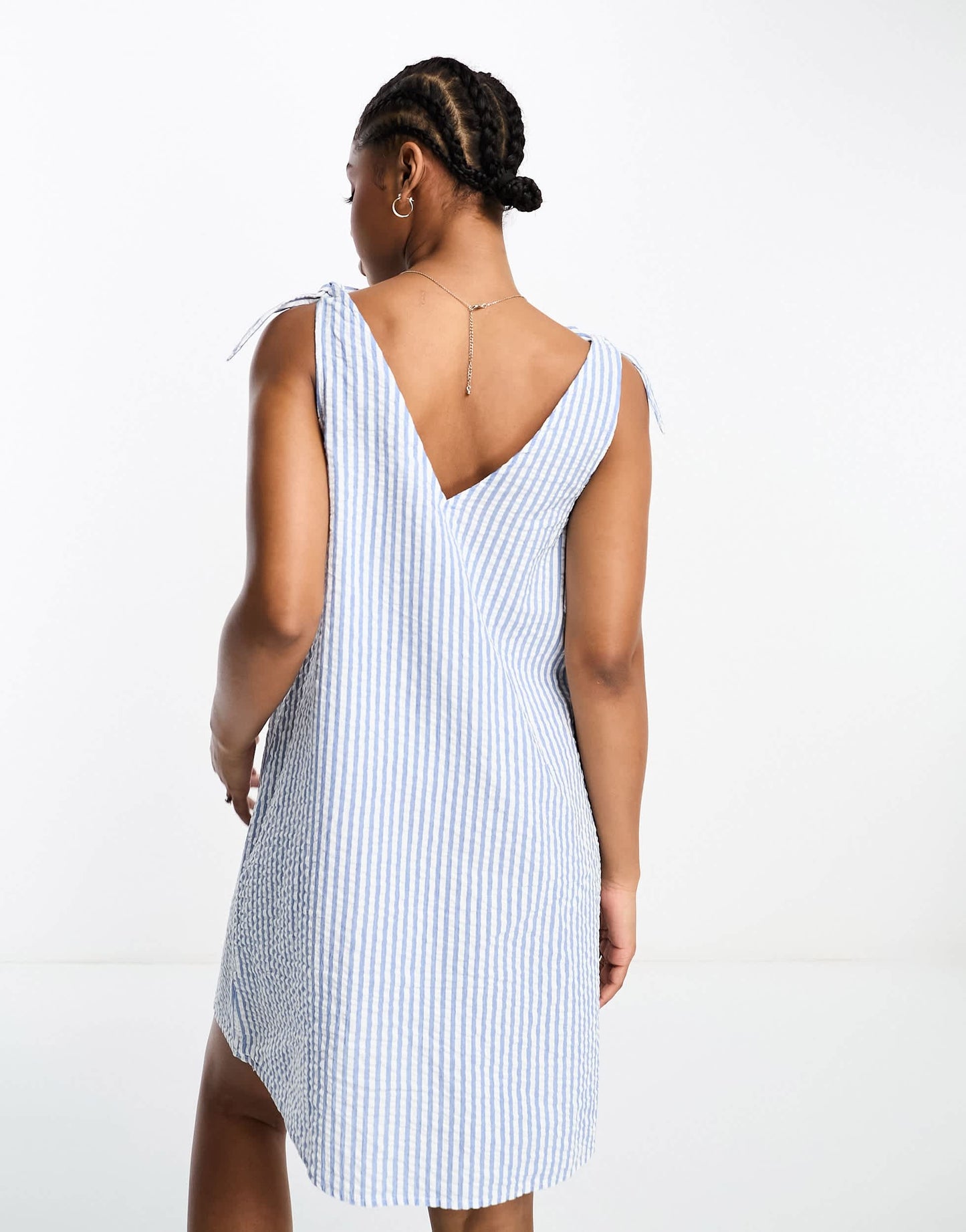 Monki seersucker bow tie strap mini dress with side pockets in blue and white stripe