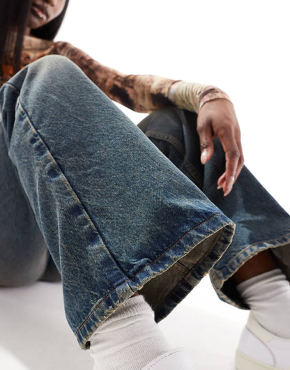 COLLUSION mid rise relaxed flare jeans in dirty wash - MBLUE