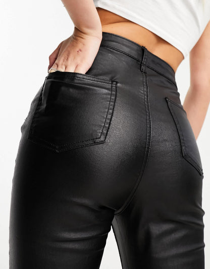 In The Style exclusive coated high waisted skinny jeans in black