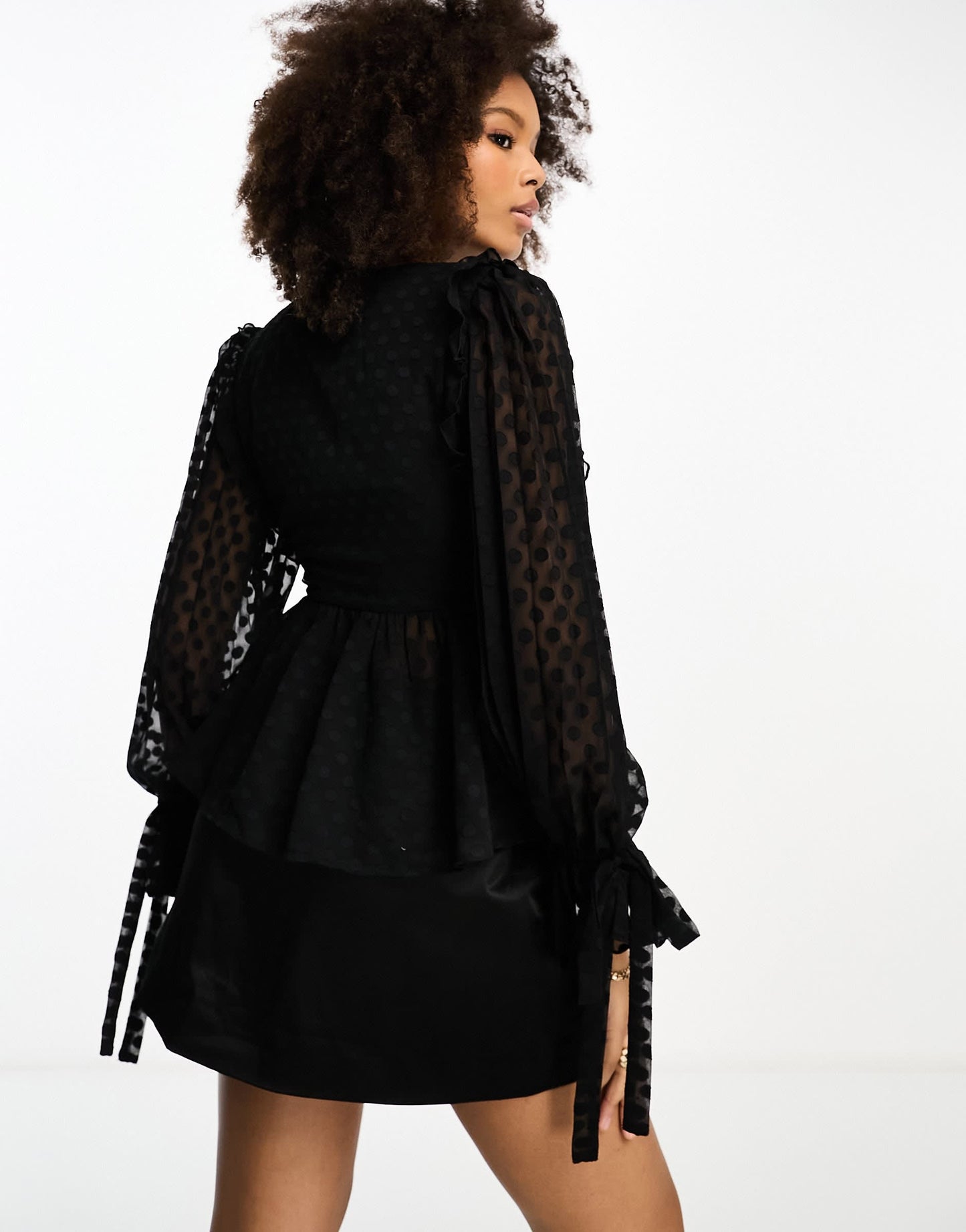 ASOS DESIGN long sleeve dobby top with wrap & ruffle cuff in black