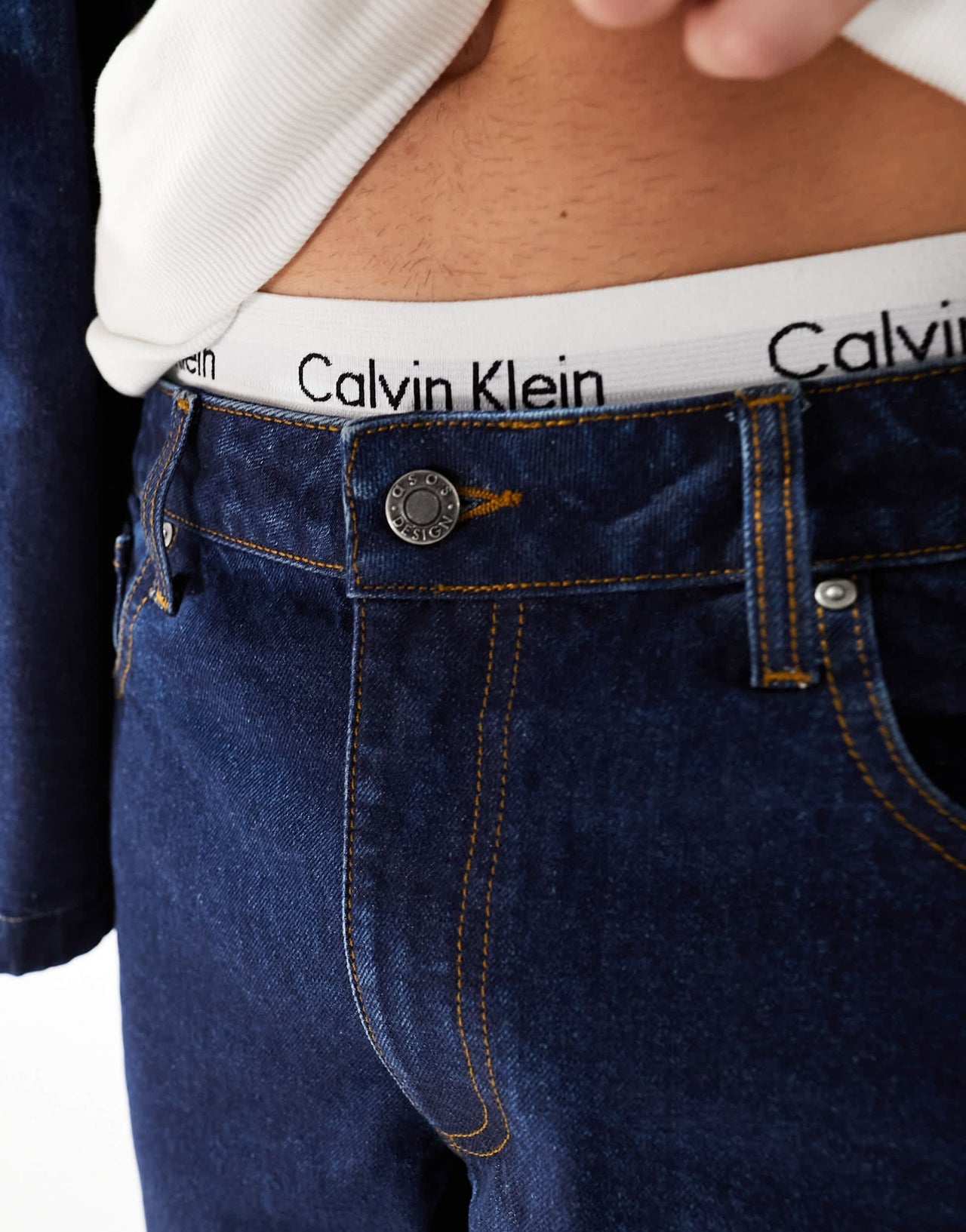 ASOS DESIGN tapered fit jeans in indigo - MBLUE