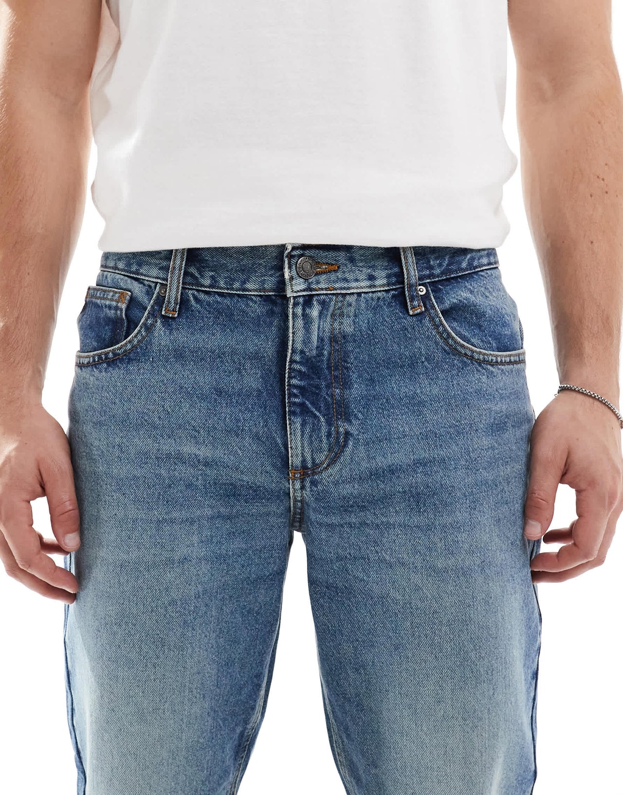 ASOS DESIGN tapered fit jeans in tinted dark wash blue