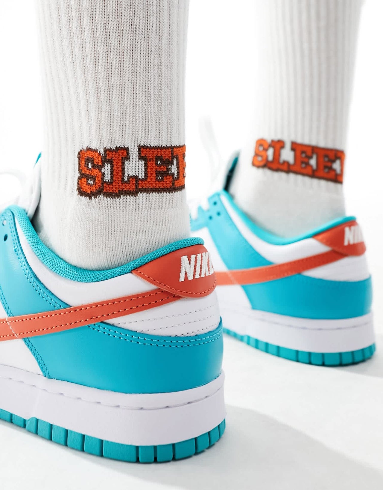 Nike Dunk Low Retro trainers in white and blue