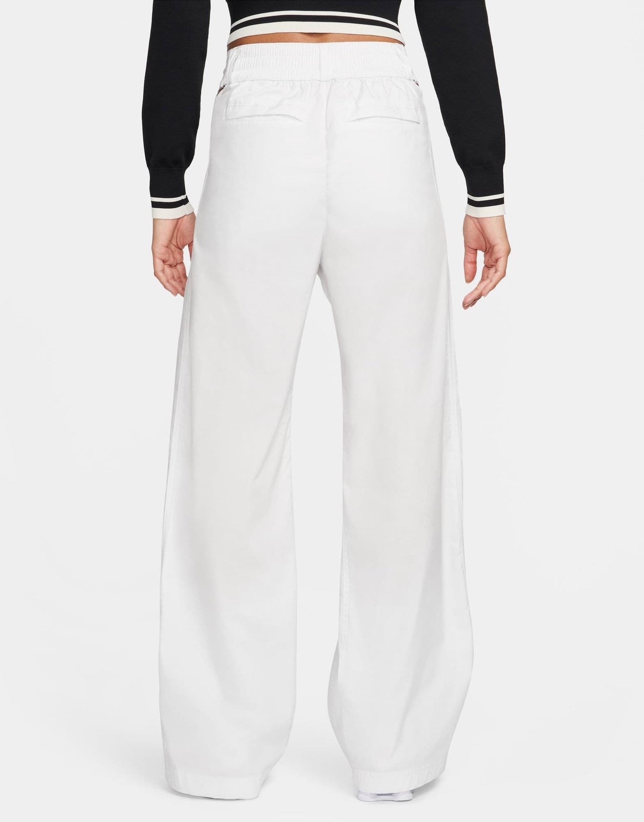 Nike cut out waist woven baggy trousers in white