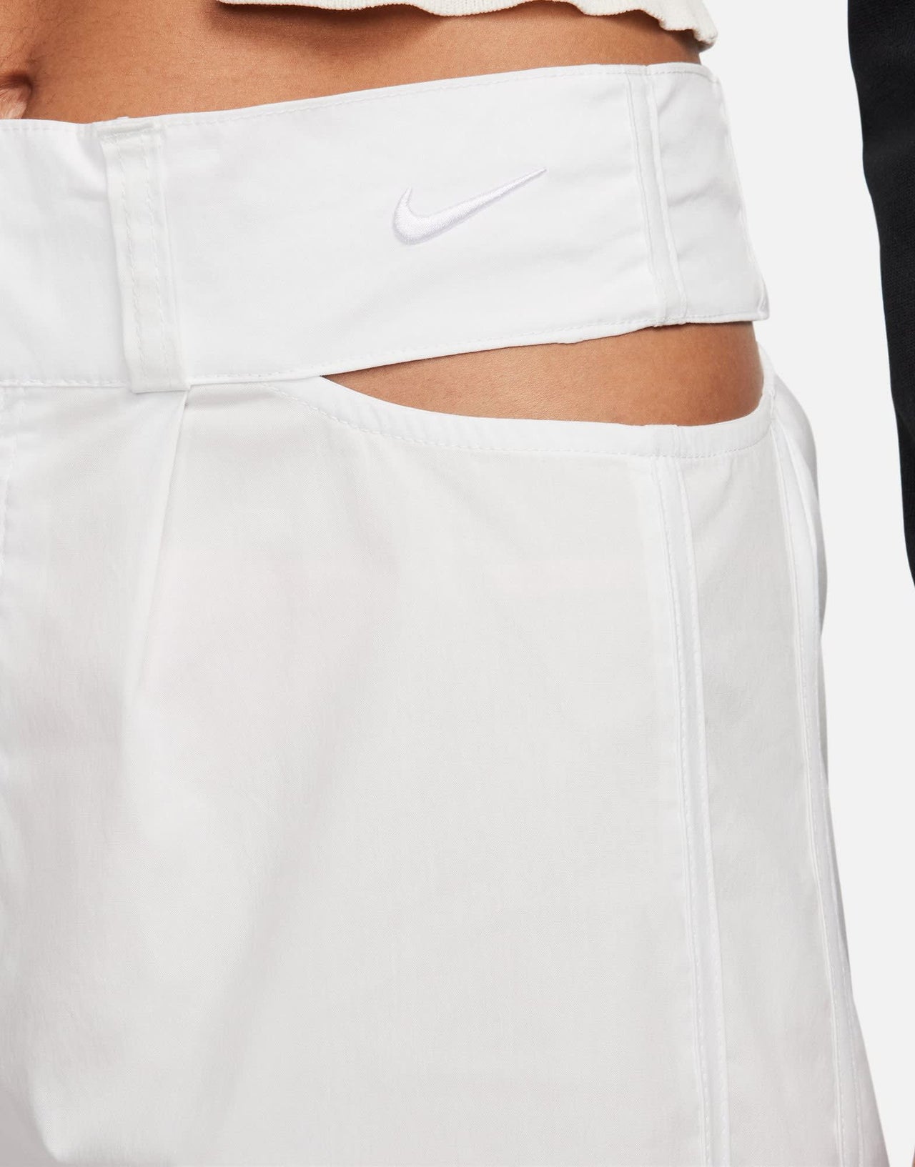 Nike cut out waist woven baggy trousers in white