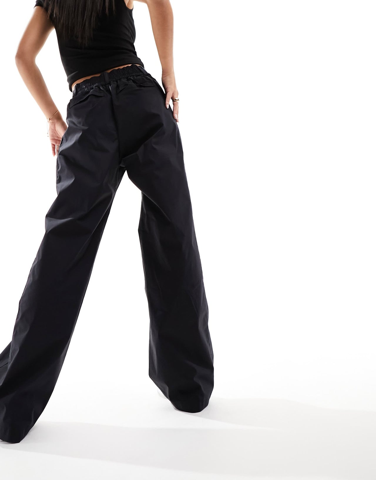 Nike cut out waist woven baggy trousers in black