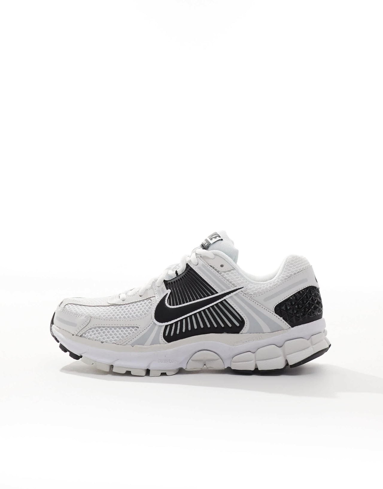 Nike Zoom Vomero 5 trainers in white and black