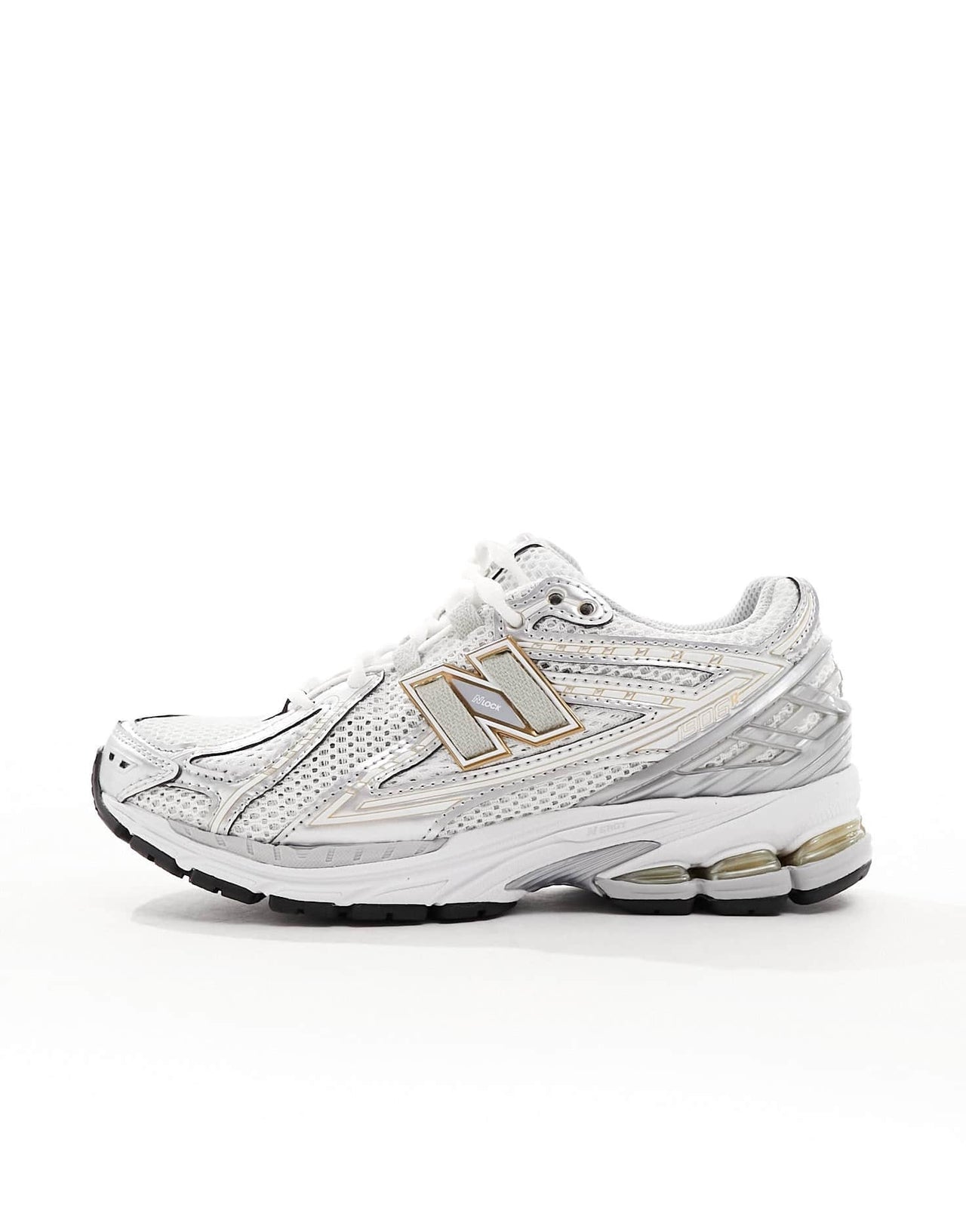 New Balance 1906 trainers in silver and gold