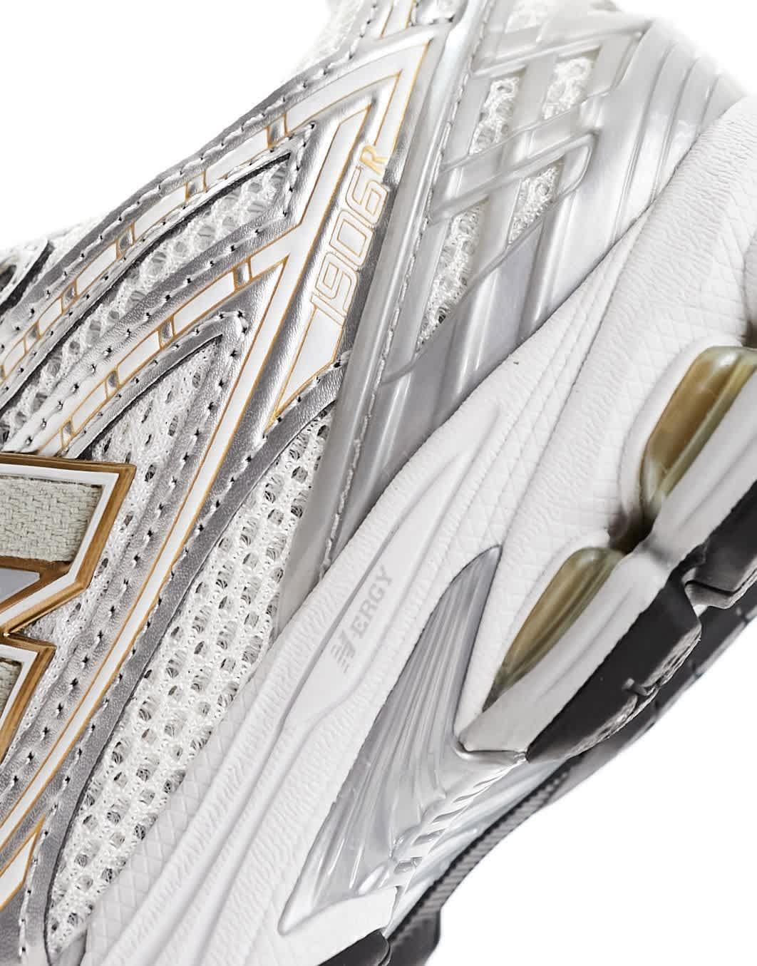 New Balance 1906 trainers in silver and gold