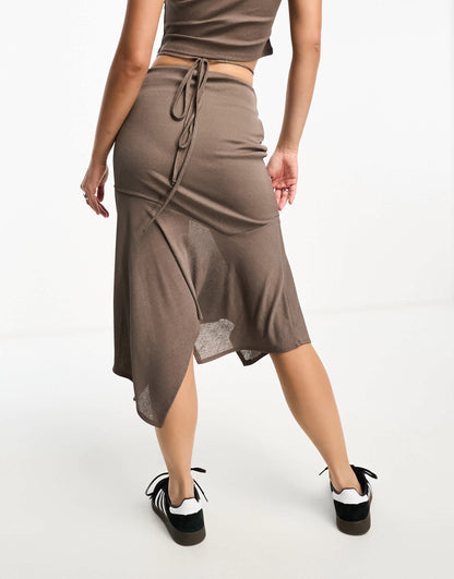 Reclaimed Vintage sheer asymmetric midi skirt with tie waist in brown