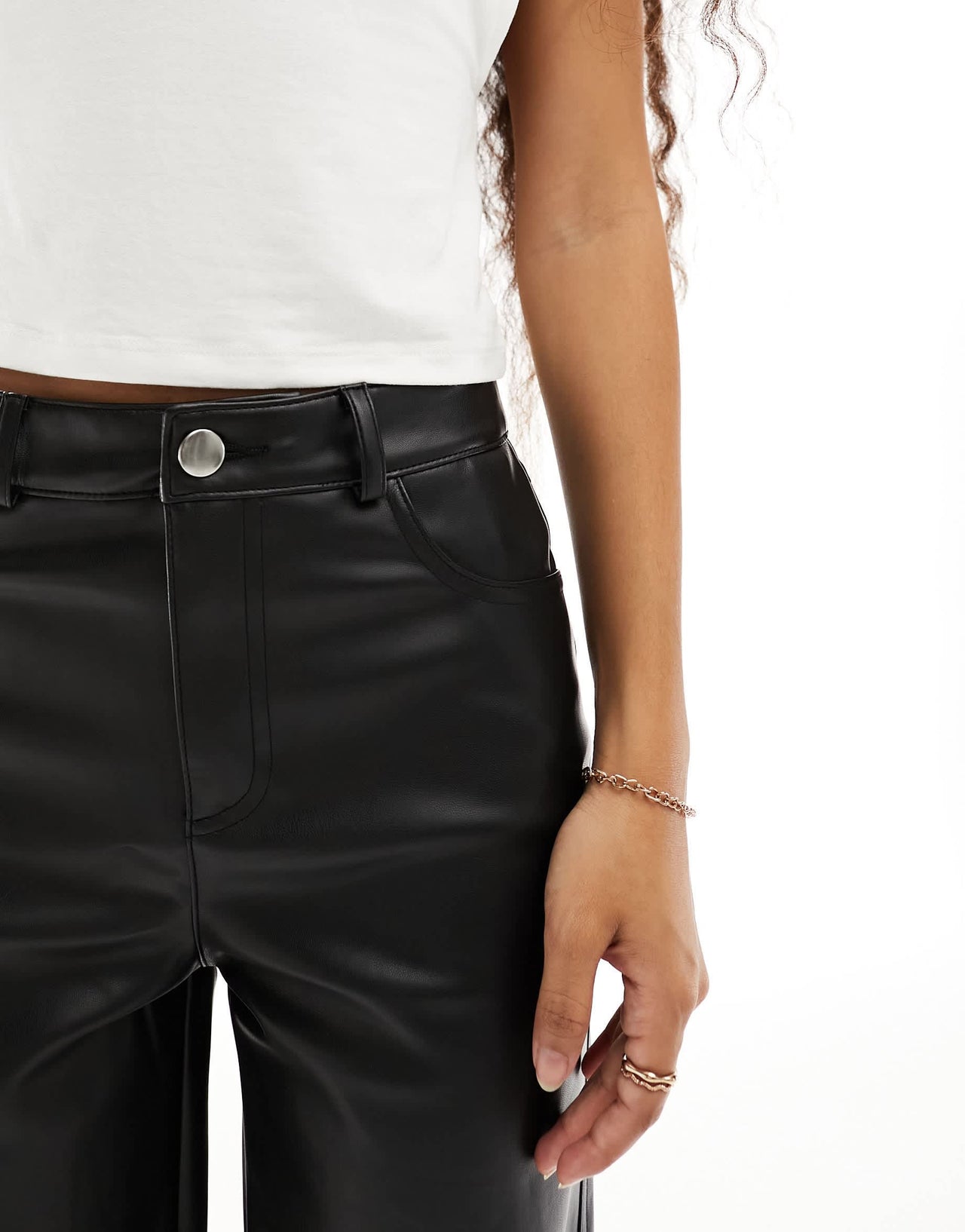 Stradivarius Petite faux leather straight leg trouser in black