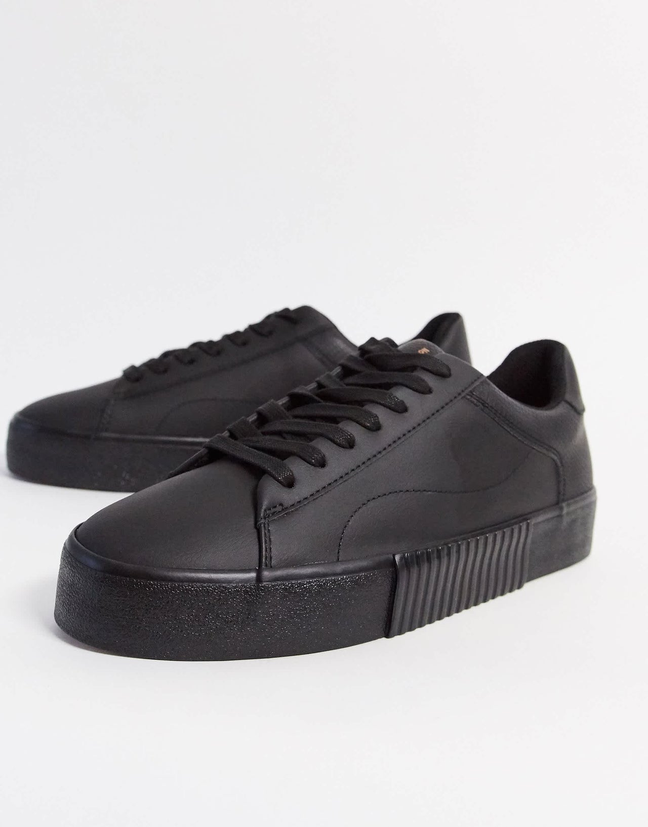 Bershka black trainer contrast embossed animal print