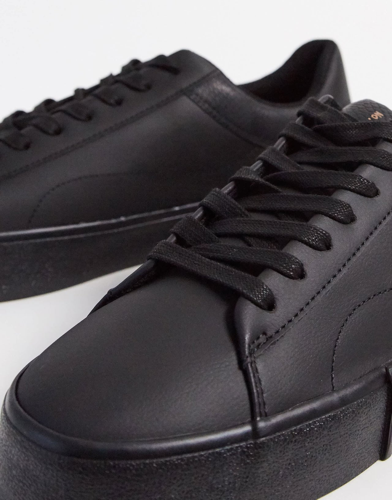 Bershka black trainer contrast embossed animal print