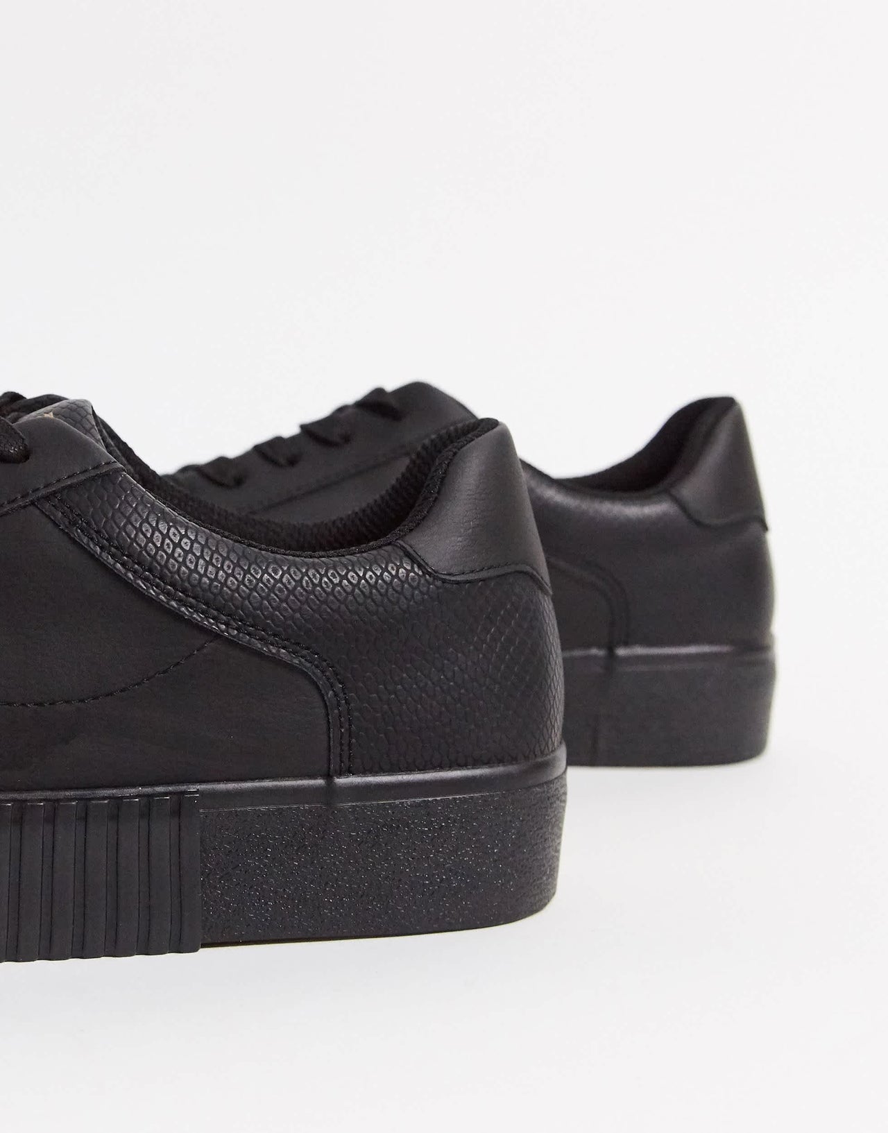 Bershka black trainer contrast embossed animal print