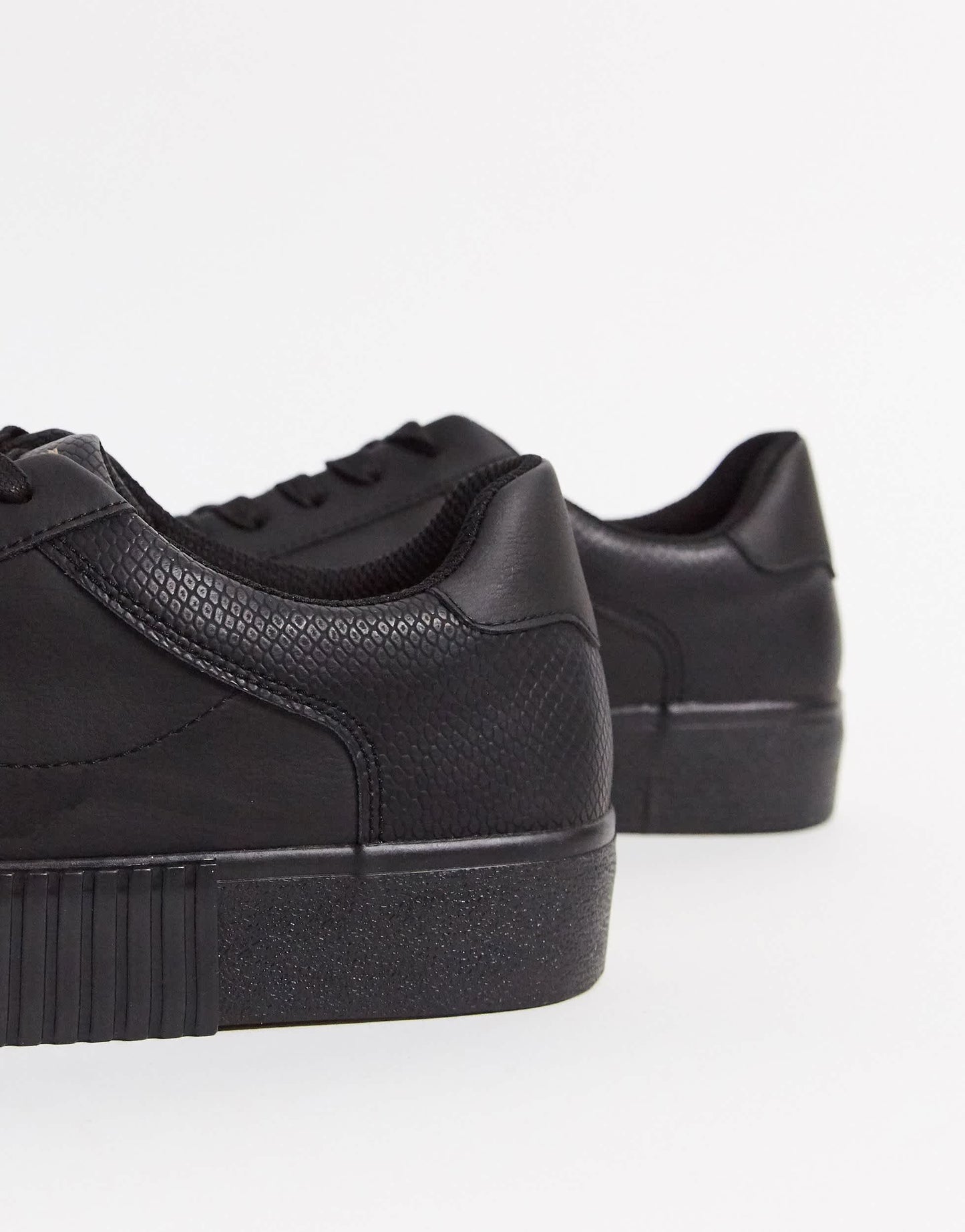 Bershka black trainer contrast embossed animal print
