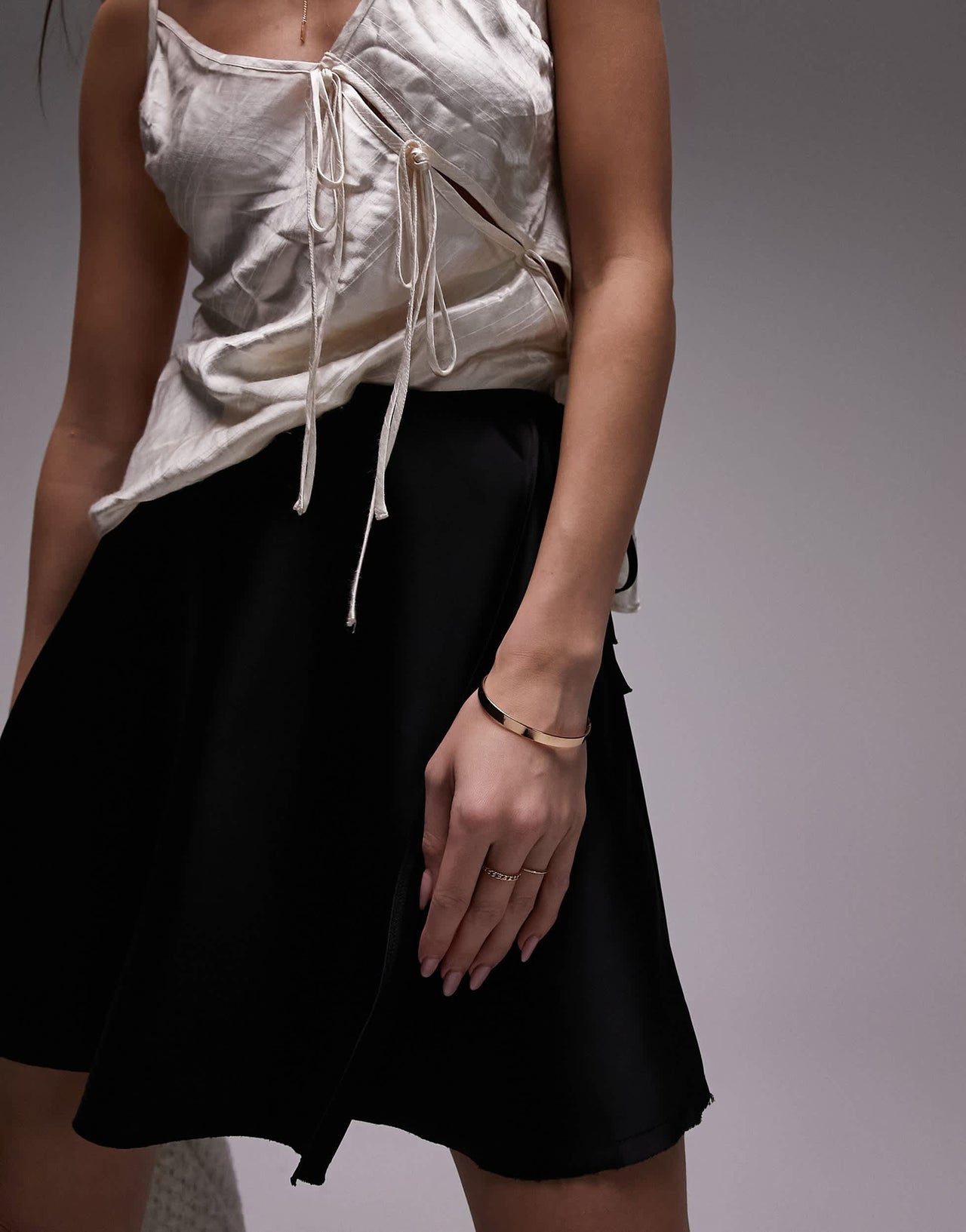 Topshop raw edge wrap mini skirt in black