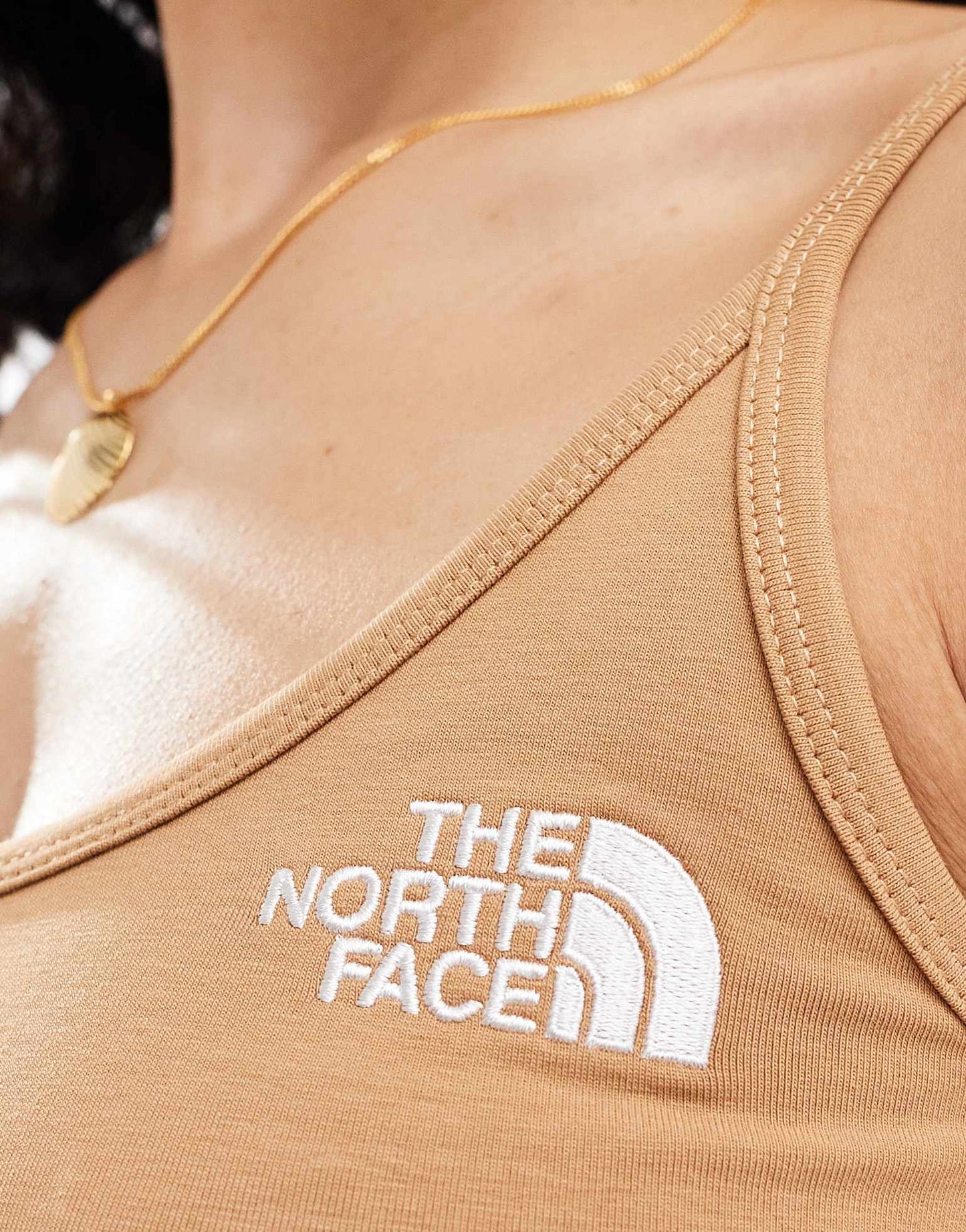 The North Face cropped tank top in beige Exclusive at ASOS