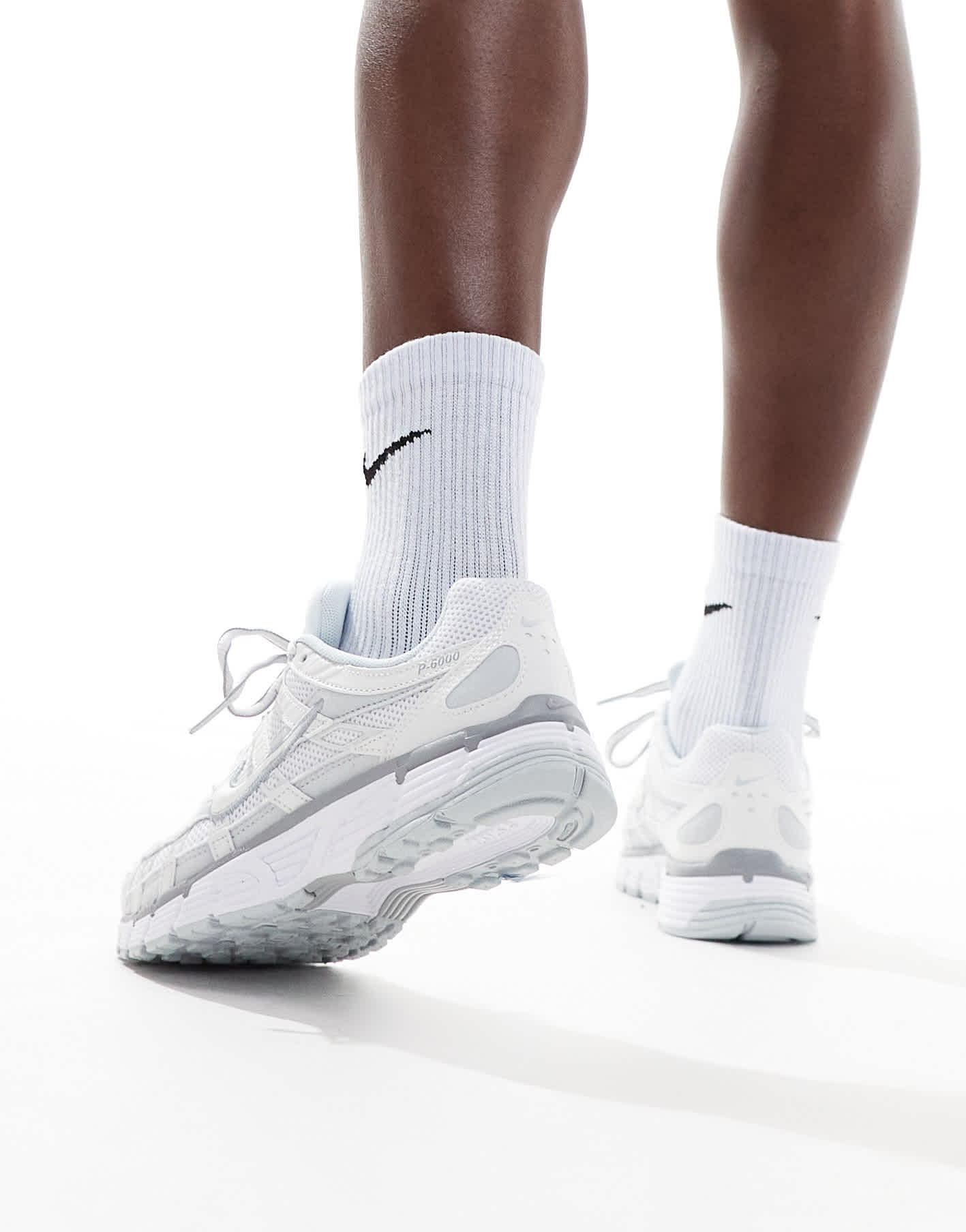 Nike P-6000 trainers in white and silver