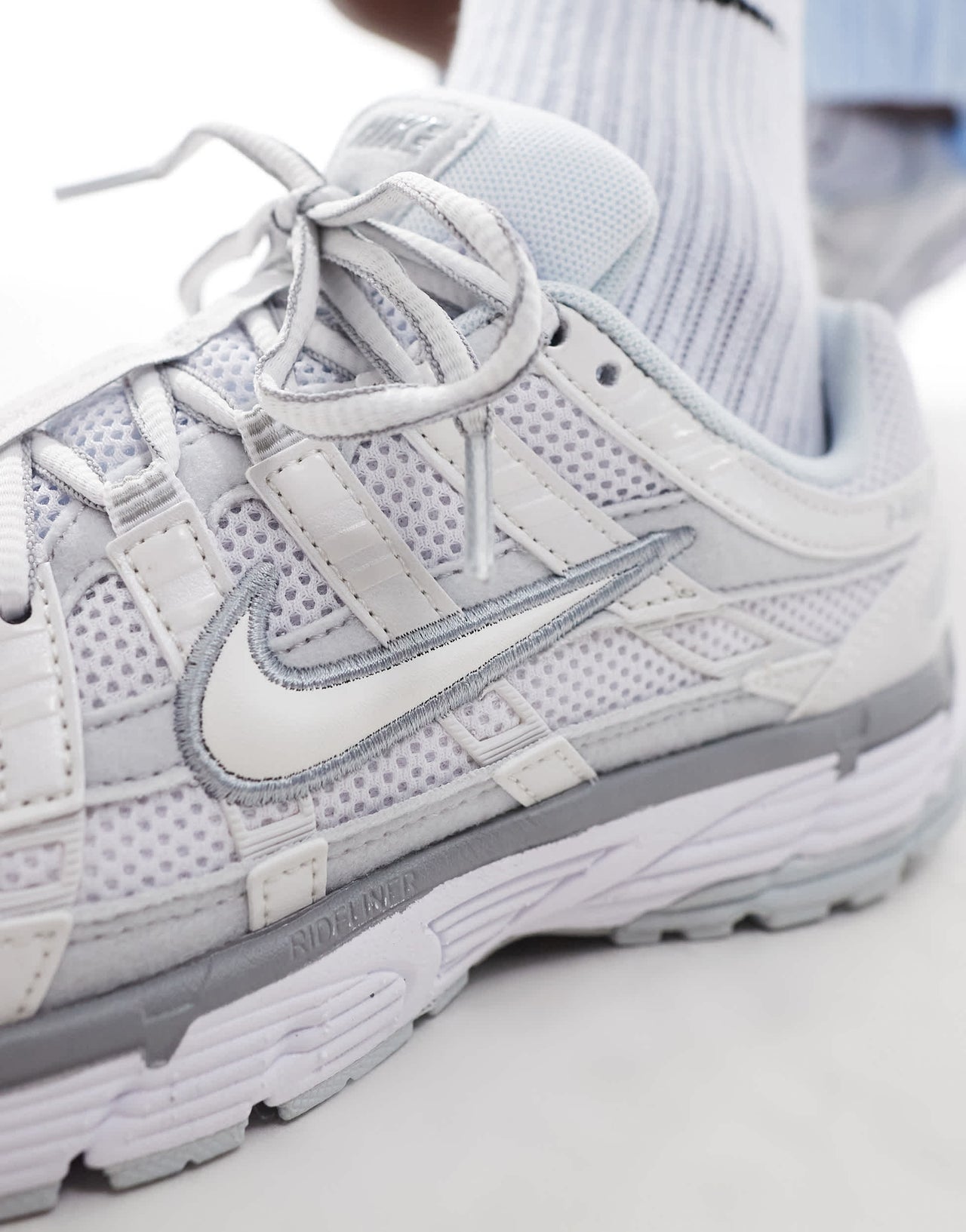 Nike P-6000 trainers in white and silver