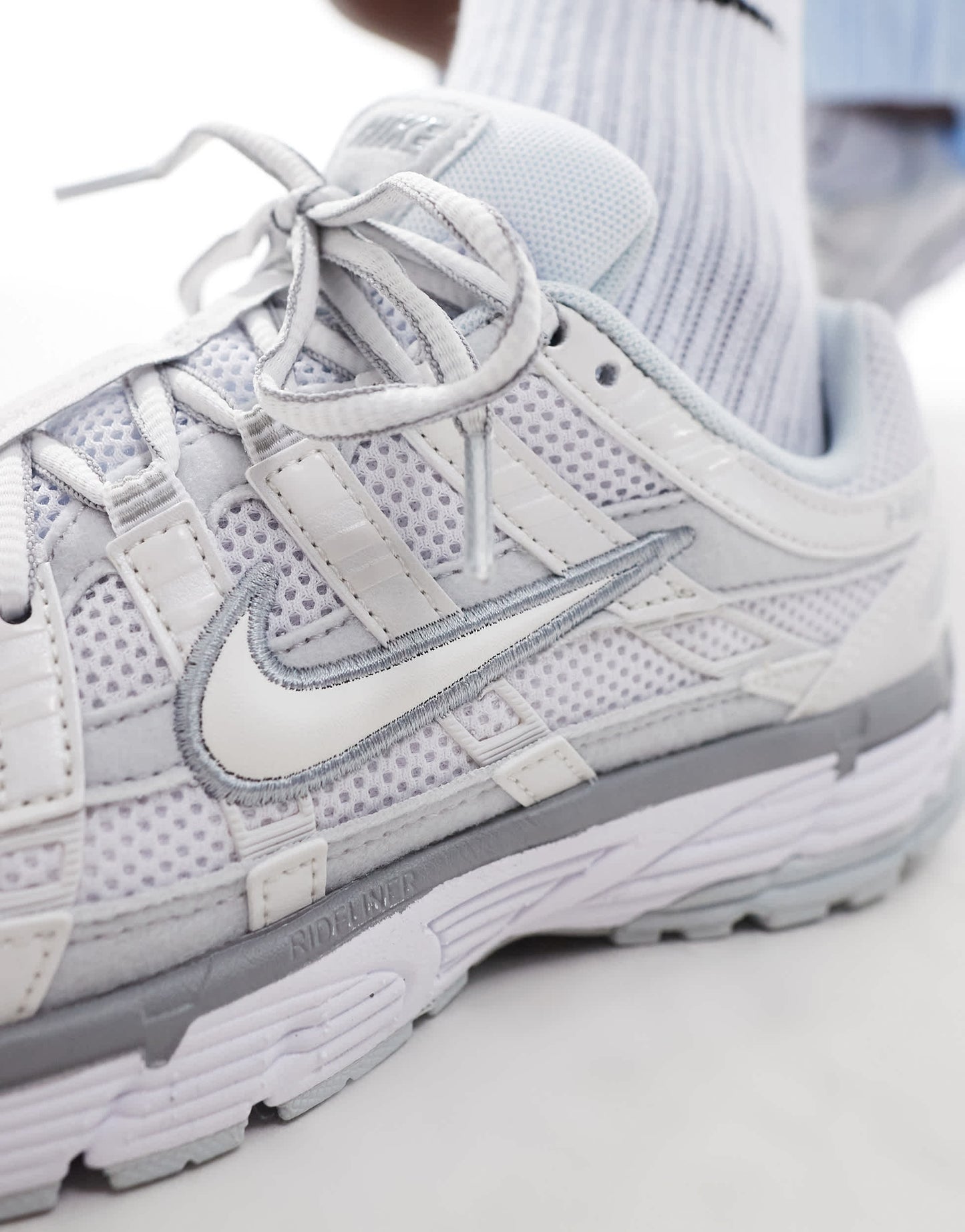 Nike P-6000 trainers in white and silver