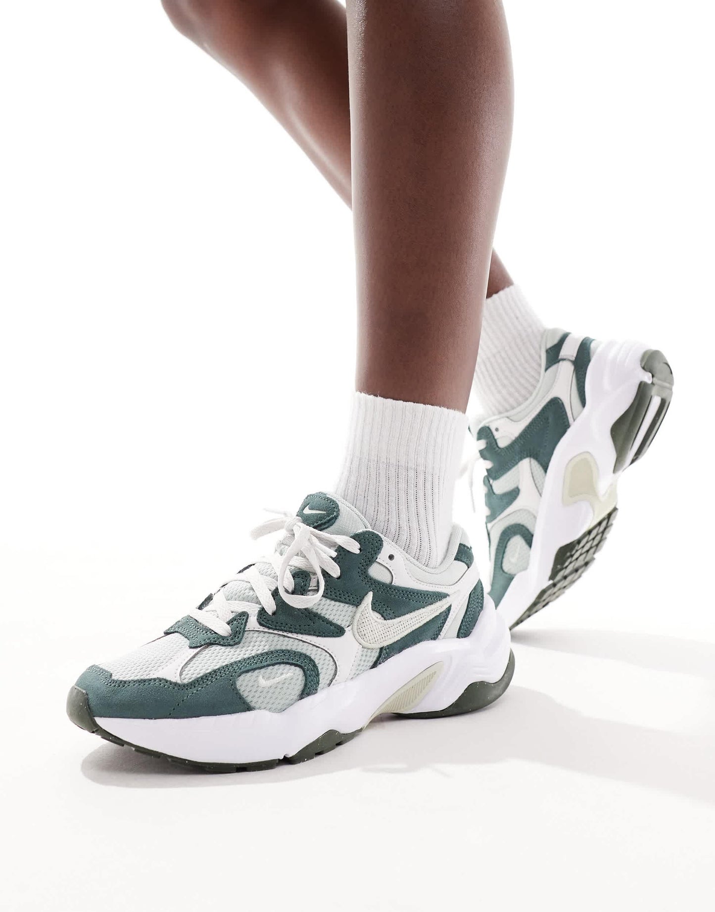 Nike AL8 trainers in green and white