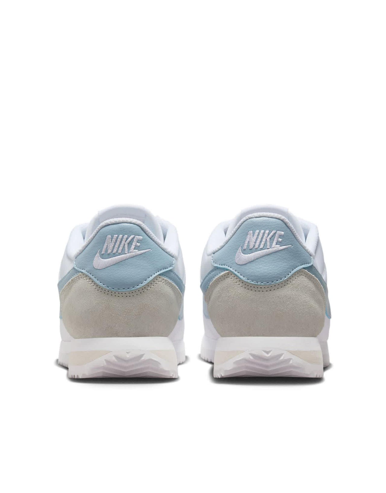 Nike Cortez TXT trainers in white and blue