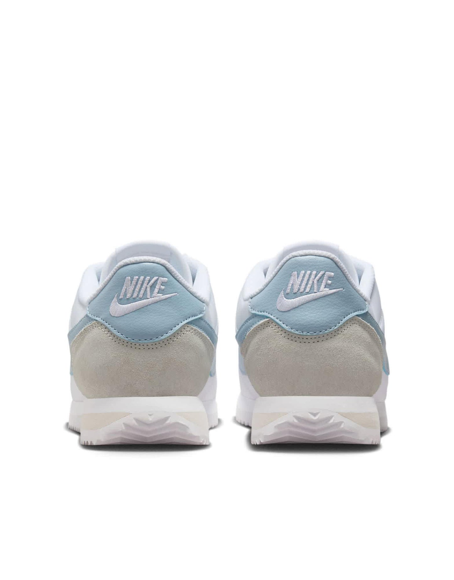 Nike Cortez TXT trainers in white and blue