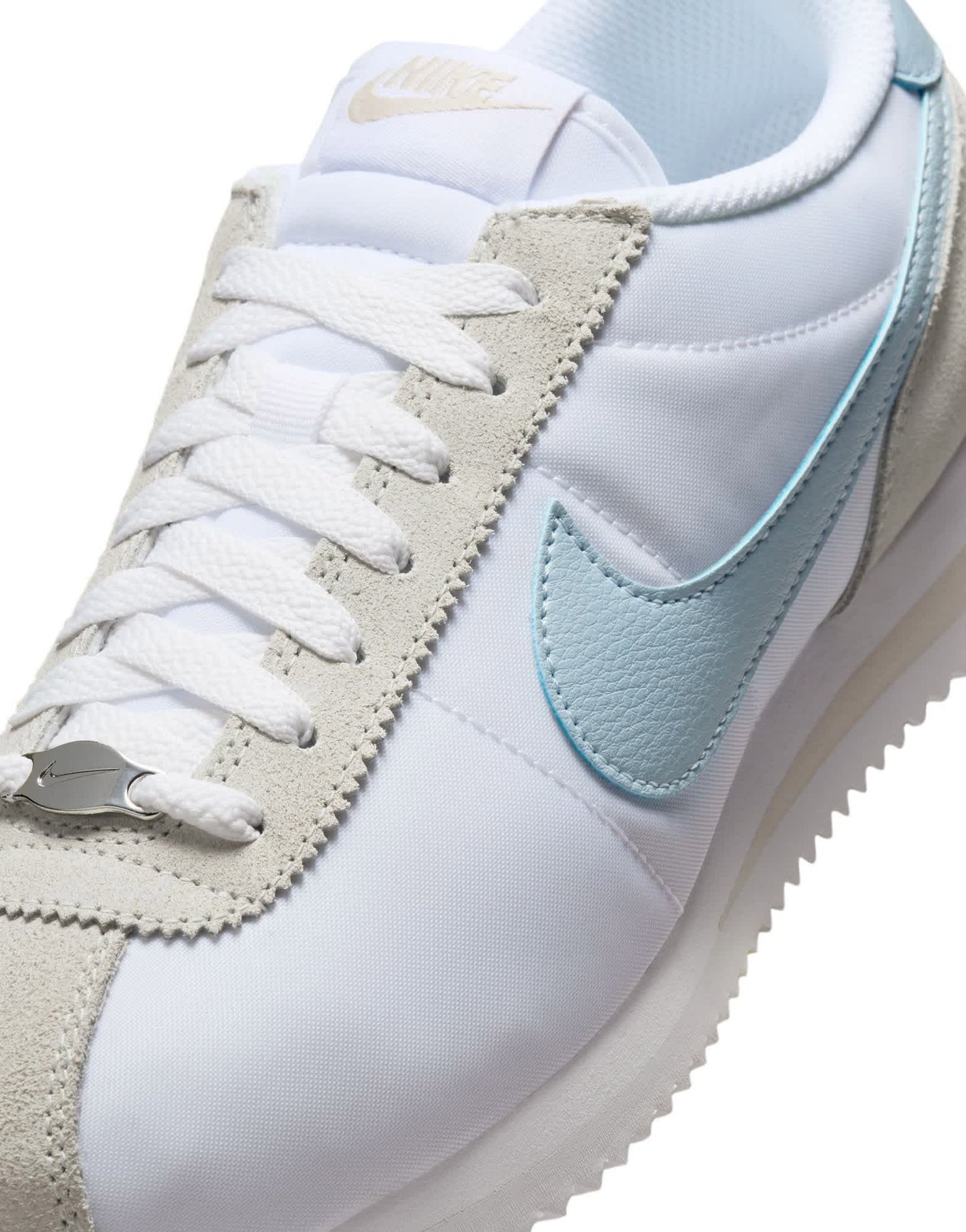 Nike Cortez TXT trainers in white and blue