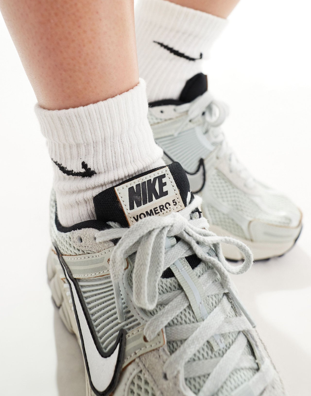 Nike Zoom Vomero 5 in light blue and silver