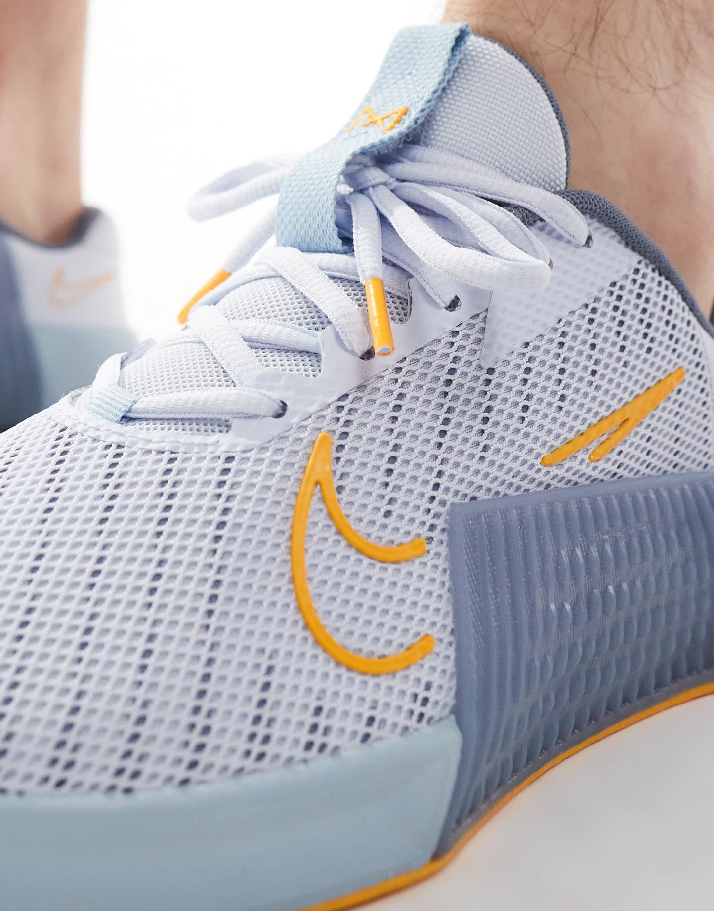 Nike Training Metcon 9 trainers in grey and orange