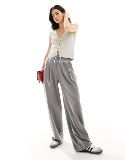 ASOS DESIGN knitted waistcoat with tie front in grey