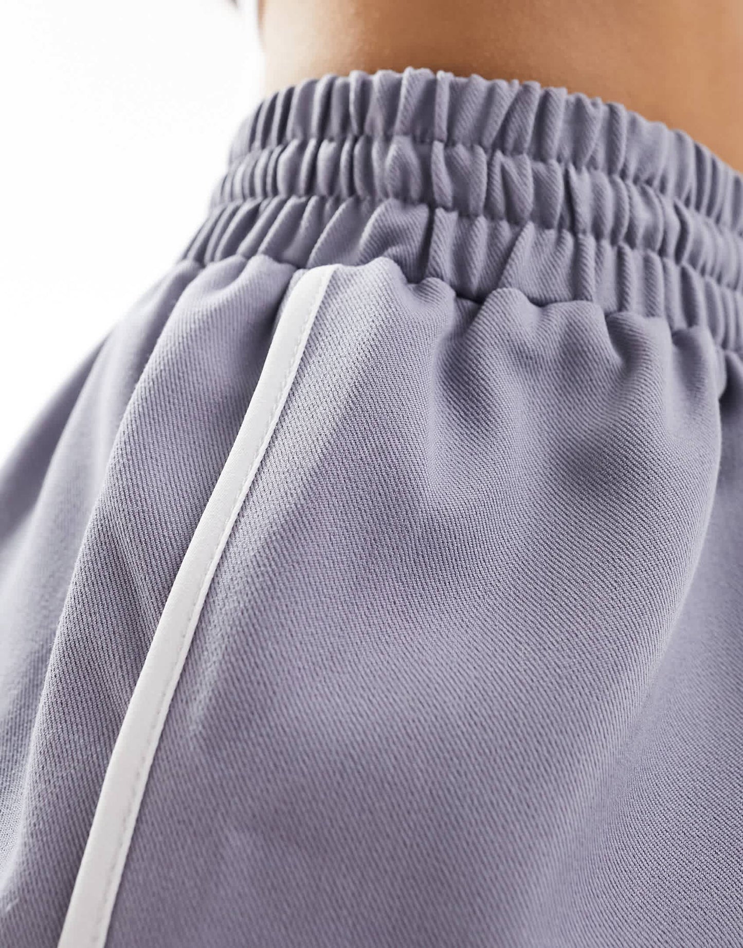 In The Style drawstring piping detail runner shorts in slate blue