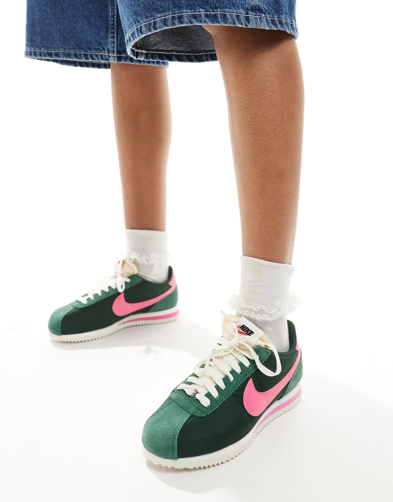 Nike Cortez TXT unisex trainers in dark green and pink