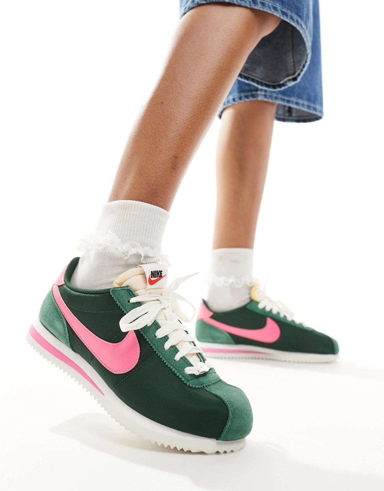 Nike Cortez TXT unisex trainers in dark green and pink