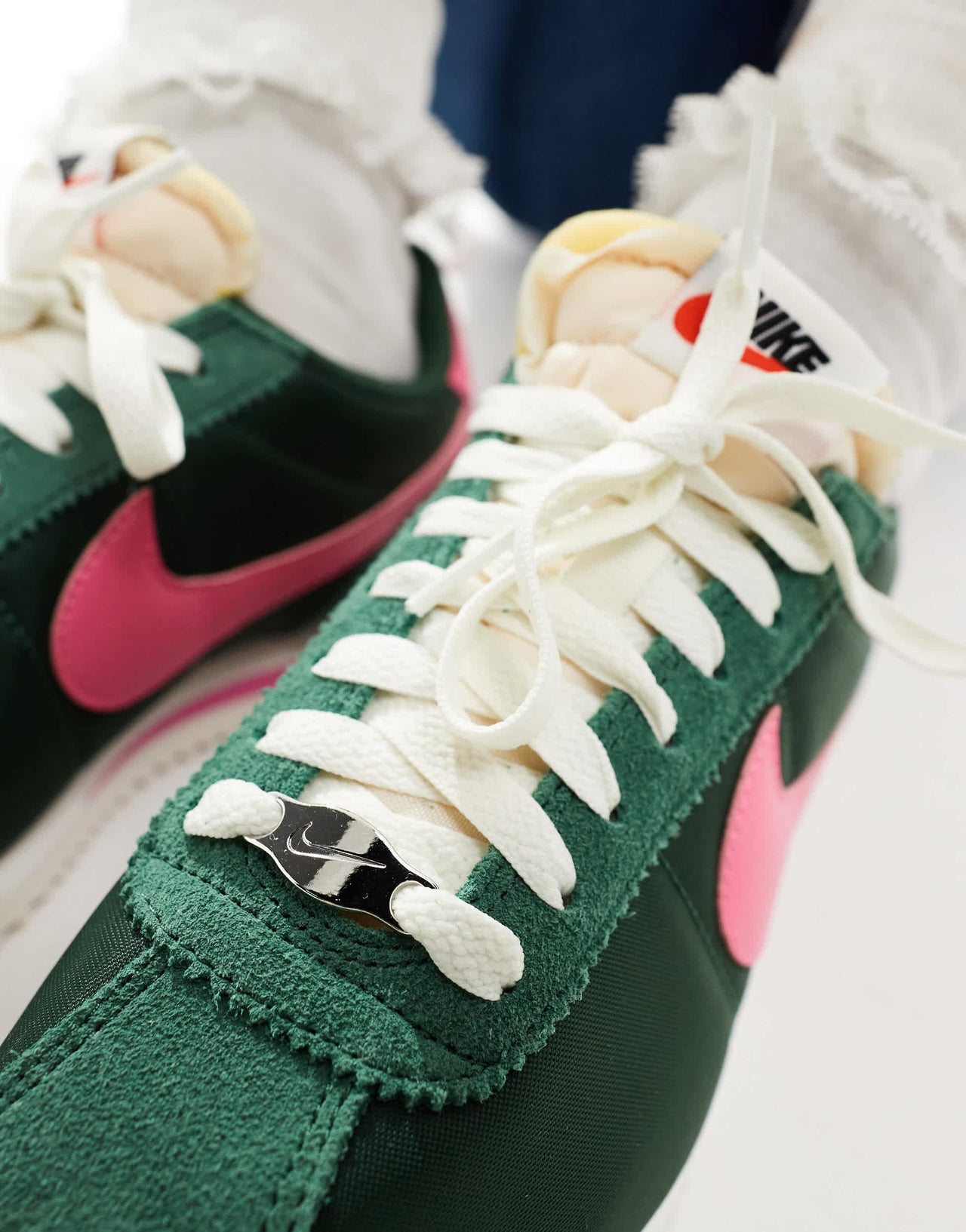 Nike Cortez TXT unisex trainers in dark green and pink