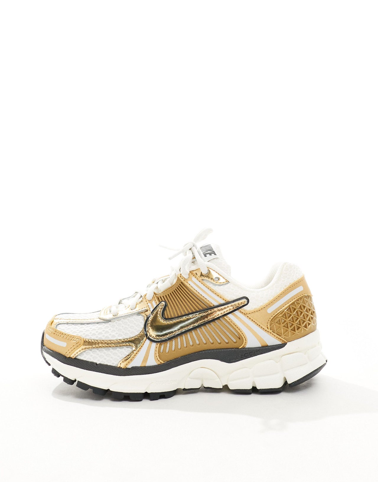 Nike Zoom Vomero 5 trainers in white and gold