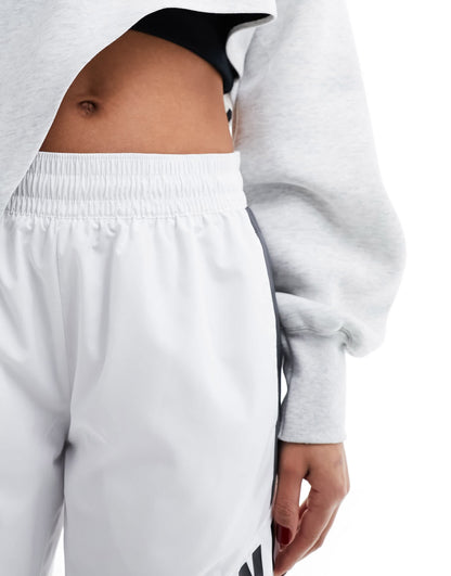 Nike Streetwear woven trackpant in white and grey
